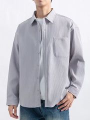 Back view showing the shirt's yoke and curved hem