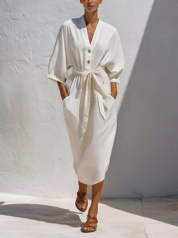 White button-front V-neck midi dress with elbow-length sleeves and self-tie waist worn by model