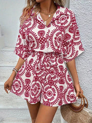 Women's printed tie-waist button-front romper, red-and-white print front view