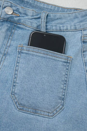 Close-up of phone in back patch pocket of denim shorts
