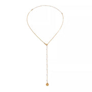 Gold-tone pearl-accented Y necklace with round coin pendant shown against white