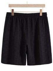 Black textured shorts, back view