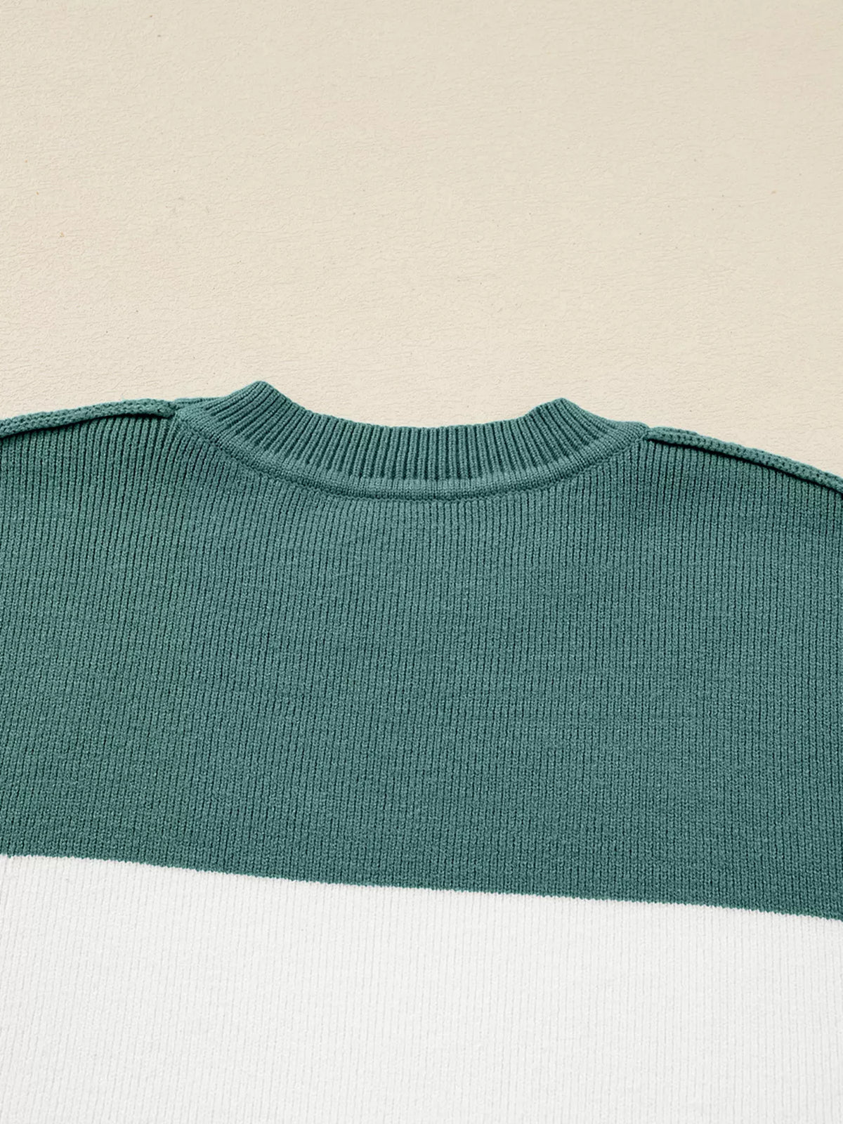 Back neckline and teal yoke detail