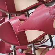 Close view of pink wedge sandal straps and open toe