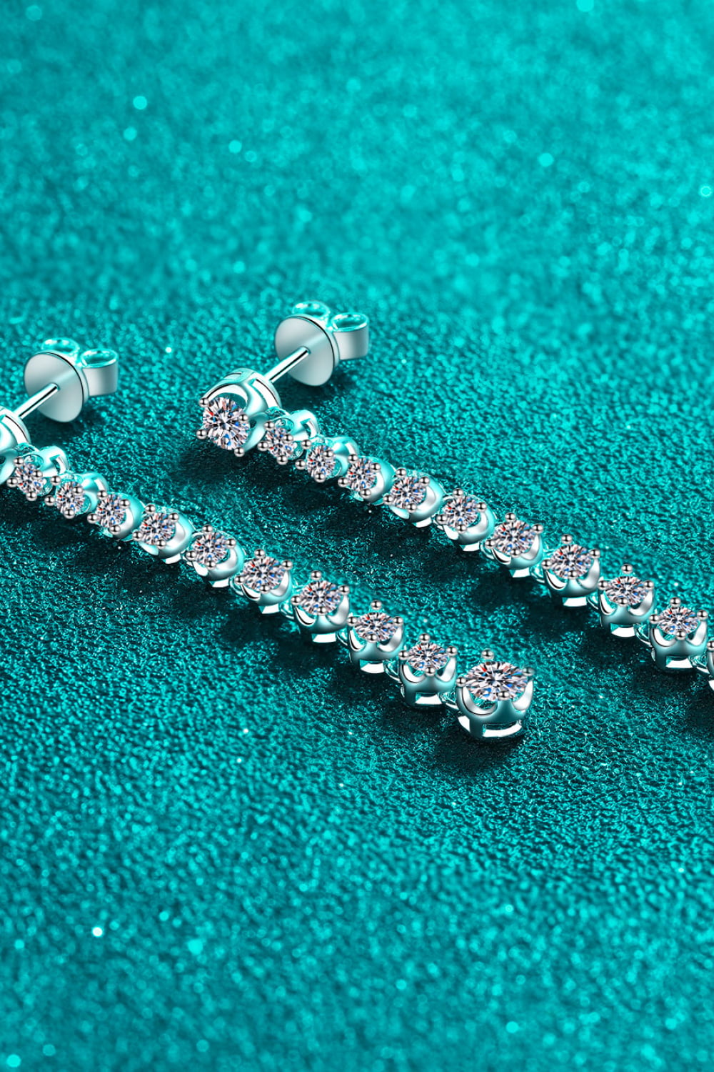 Adored 1.18 Carat Moissanite Long Earrings — Angled close-up of long moissanite earrings