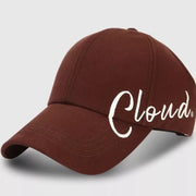 Brown baseball cap with white Cloud script embroidery