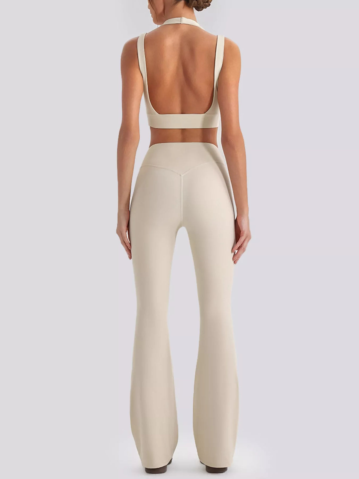 Back view of seamless criss-cross v-neck tank and leggings active set