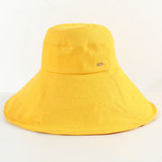 Yellow wide-brim sun hat displayed against a light background.