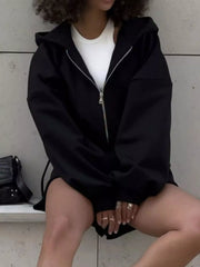 Black zip-up hoodie with oversized sleeves