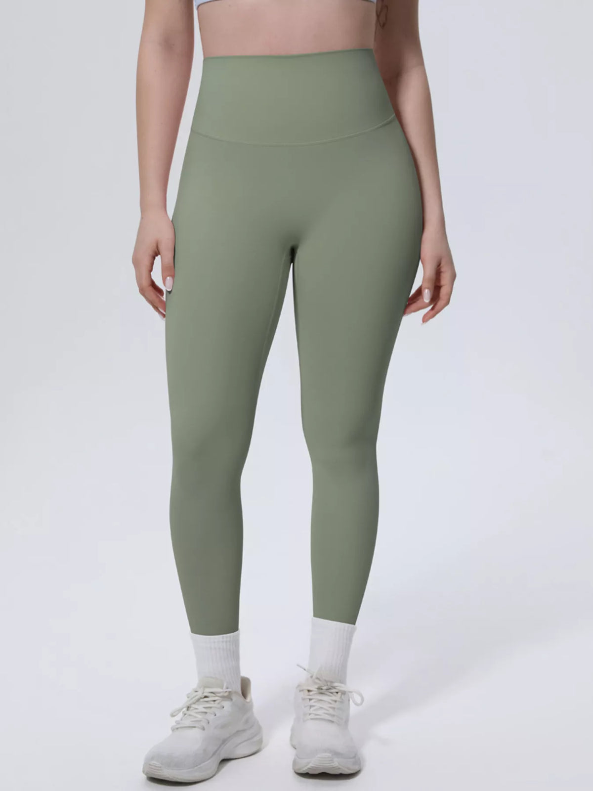 Three-quarter front view of high-waisted seamless active leggings