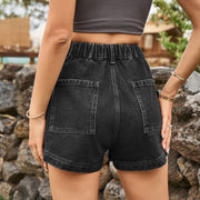 Back view of black cargo shorts with large patch pockets