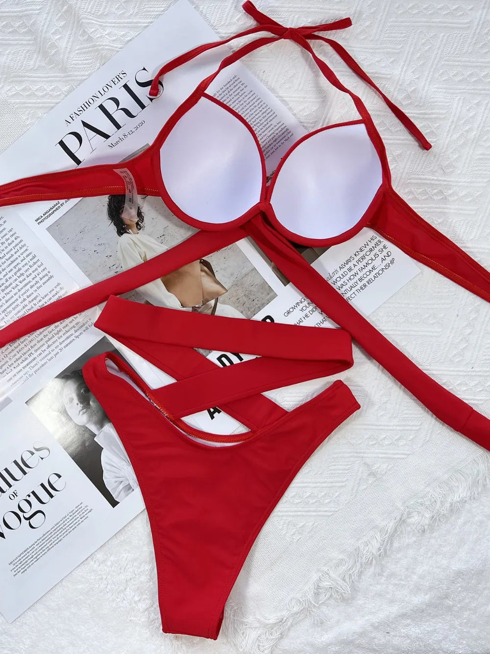Inside of red bikini top showing white cup lining