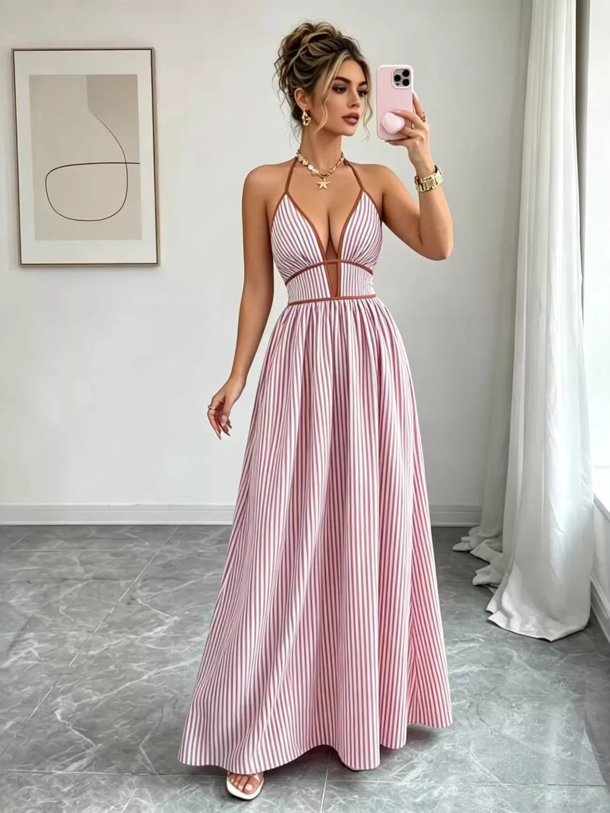 Pink halter maxi dress with contrasting neckline trim, full-length mirror view