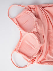 Close view of the blush cami dress's built-in bra cups and adjustable straps