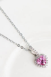 Pink heart-cut moissanite pendant on a fine silver-tone chain