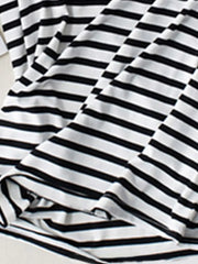 Black-and-white striped shirt detail showing built-in bra lining