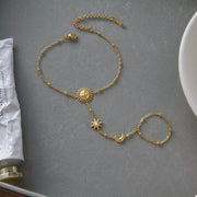 Gold-plated sun bracelet shown with adjustable chain extension