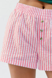 Close-up of rose pink vertical stripes and leg opening