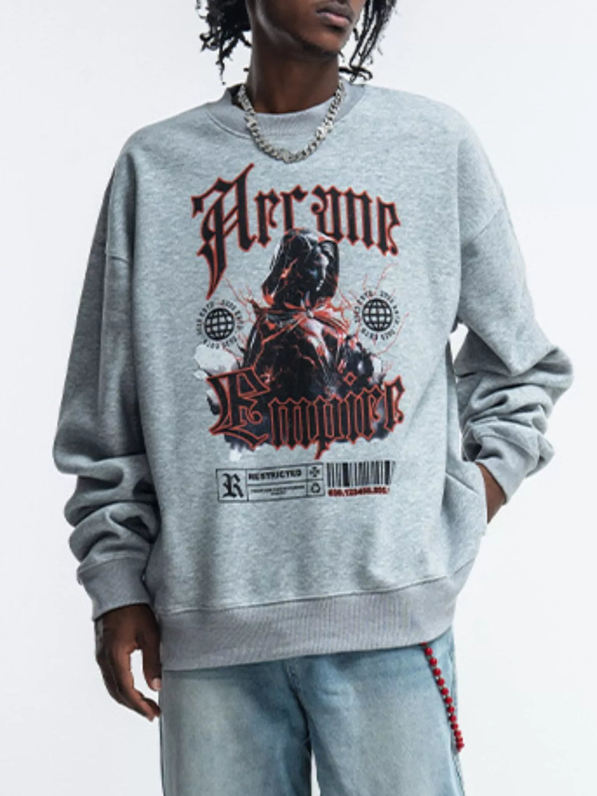 Model wearing gray gothic-print crewneck sweatshirt