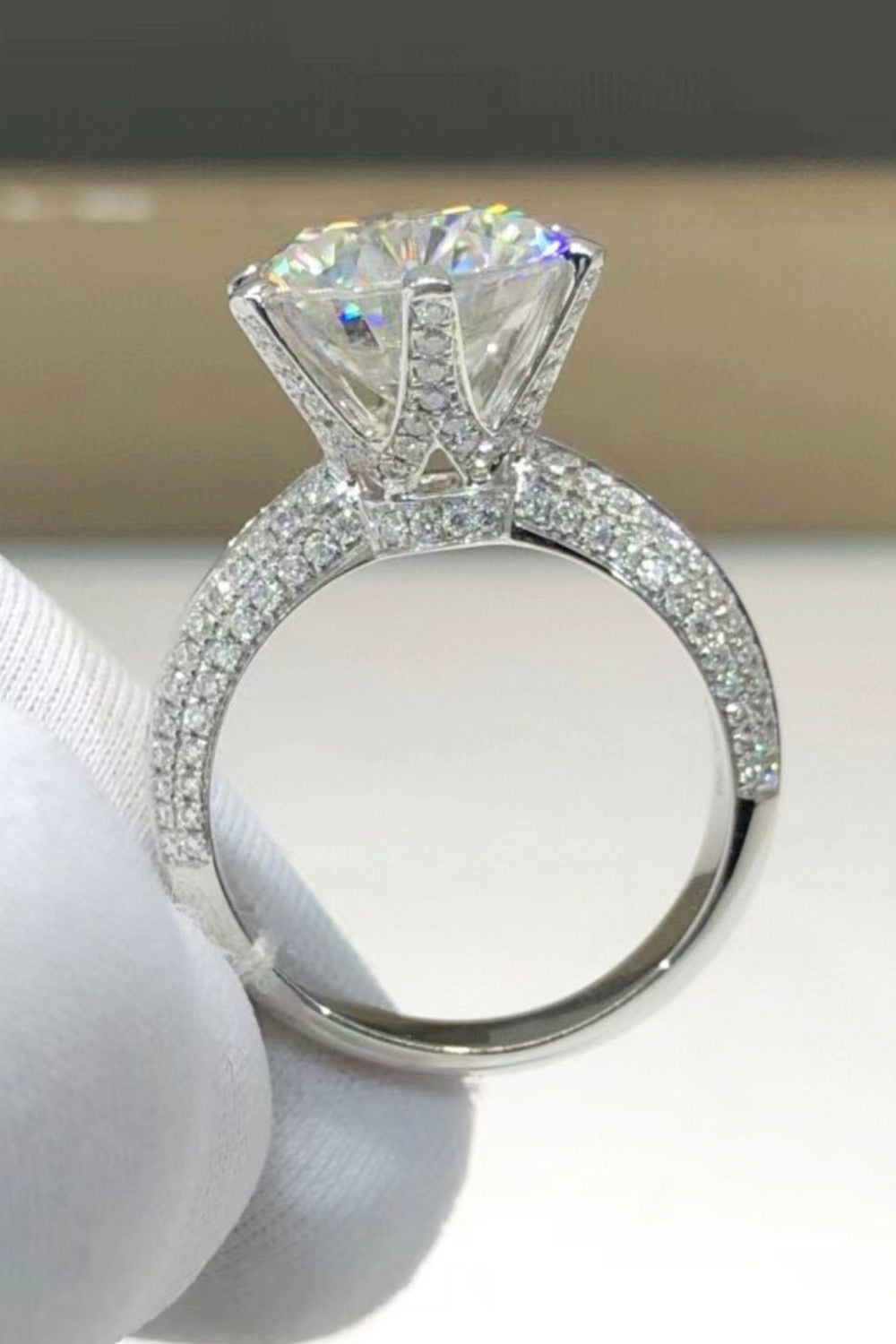5 carat moissanite 6-prong ring in platinum-plated 925 sterling silver with zircon accents, close-up
