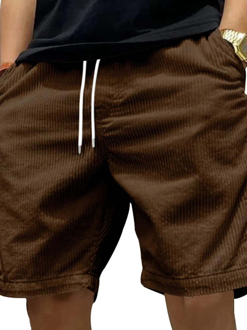 Model wearing brown drawstring shorts