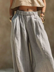 Front view of gray wide-leg pants showing the relaxed fit and elastic waist
