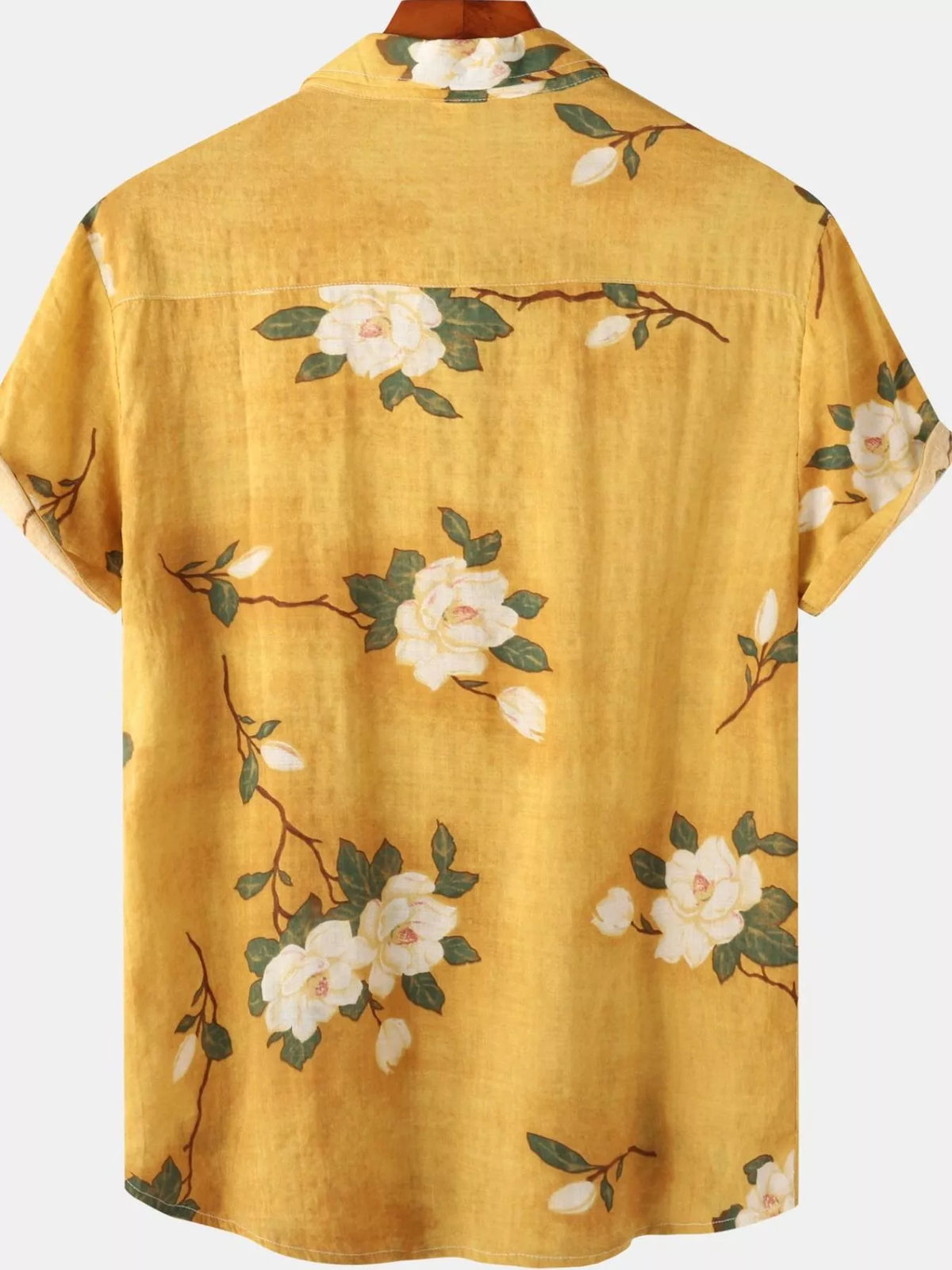 Back of mustard-yellow shirt with scattered cream floral print