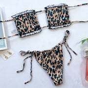 Leopard-print bikini laid flat showing the inside of the frill-trim bandeau top