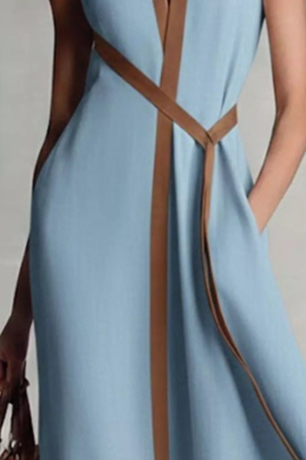 Dusty blue dress showing belt, piping and side pocket
