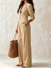 Beige button-front jumpsuit with lapel collar, angled view