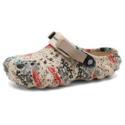 Beige printed clog with ventilation holes and rounded toe, angled product view
