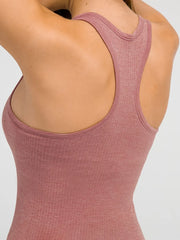 Close-up of dusty rose tank's racerback straps