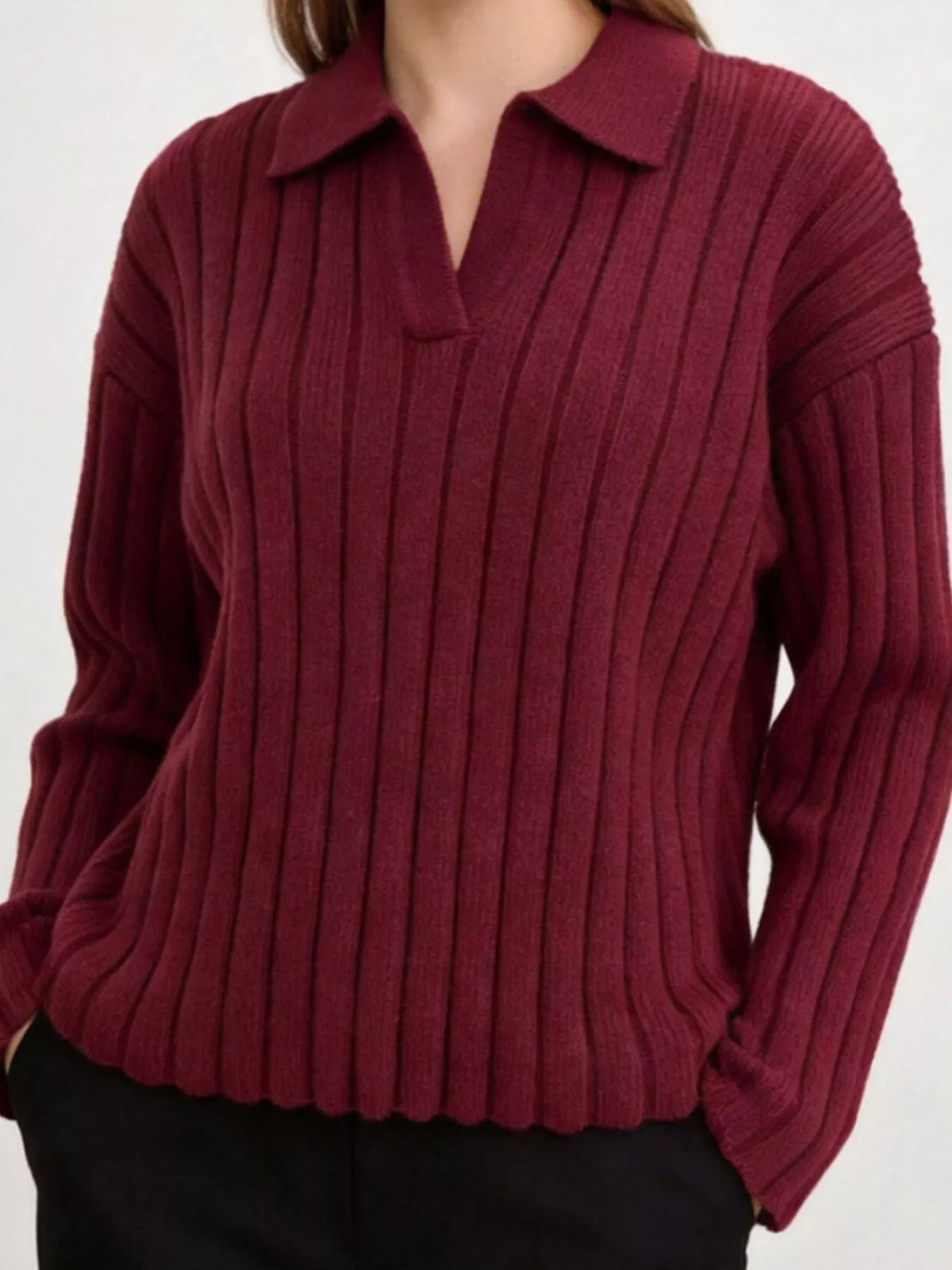 Front view of deep burgundy ribbed knit sweater with a polo collar