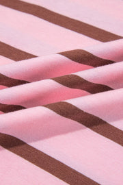 Close-up of pink and brown stripes across the shirt fabric.