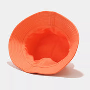 Orange bucket hat shown from the inside, revealing the crown and brim stitching