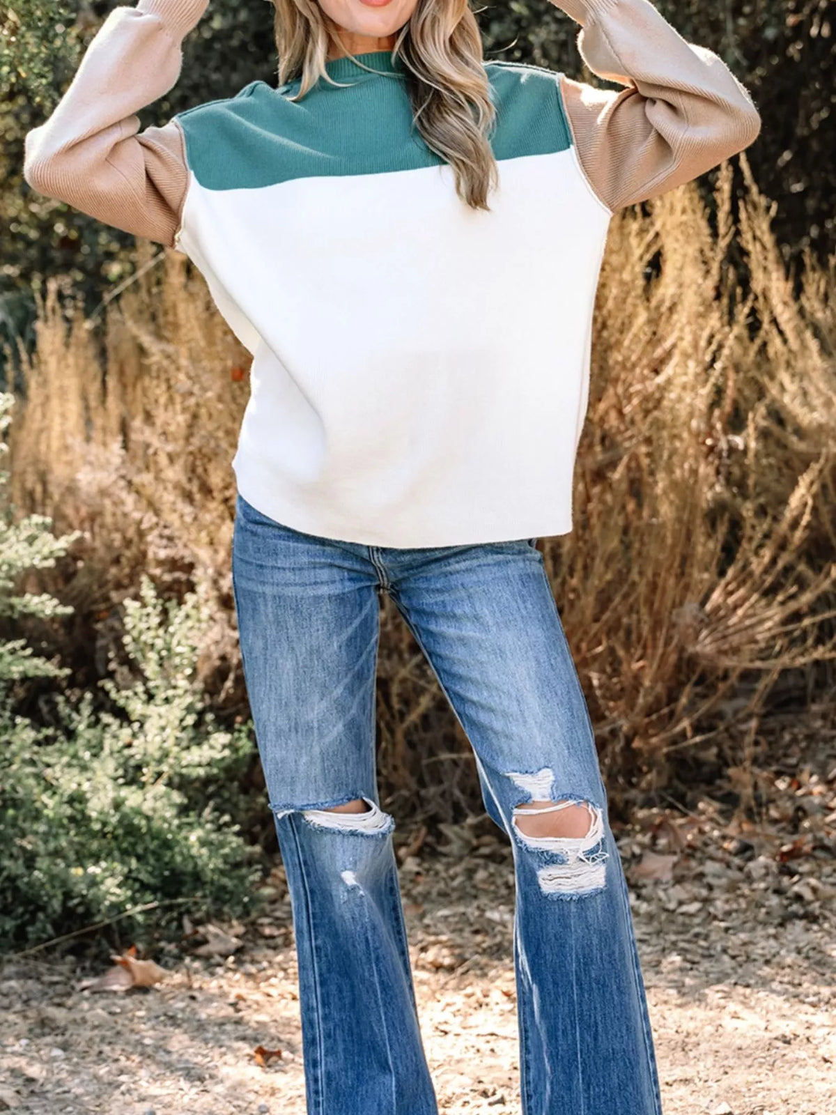 Full front view of color-block sweatshirt on model