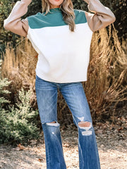 Full front view of color-block sweatshirt on model