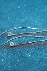 Moissanite 925 Sterling Silver Threader Earrings — Pair of threader earrings shown horizontally on blue display