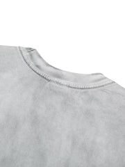 Detail of gray T-shirt shoulder and crew neckline stitching