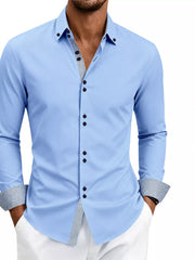 Model wearing gray shirt with contrast trim