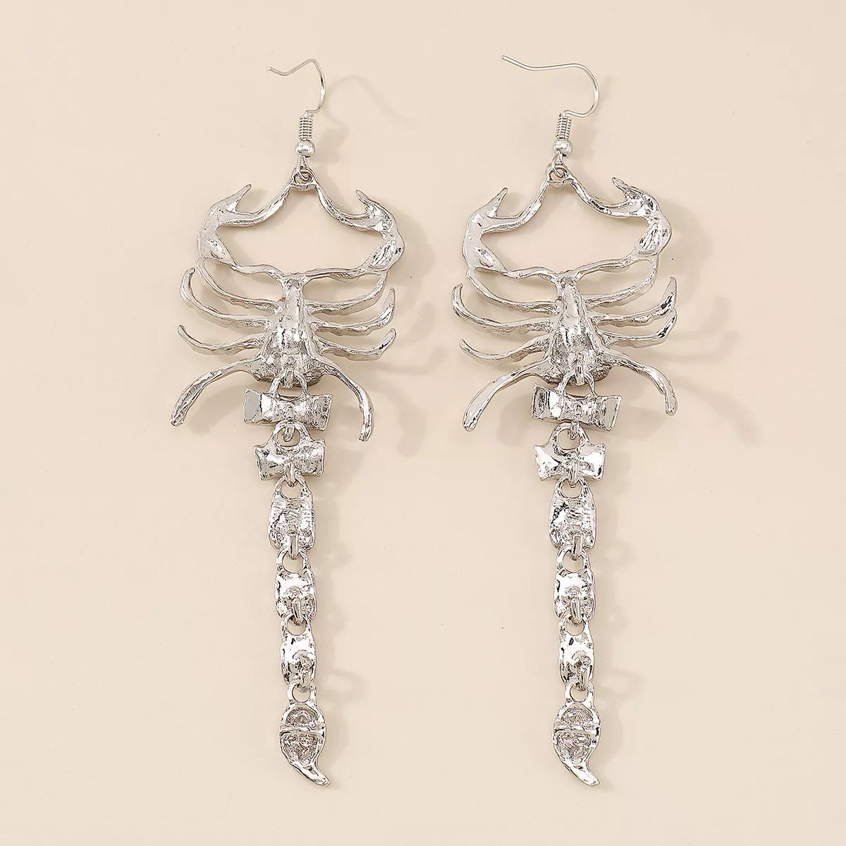 Pair of silver-tone scorpion earrings, front view