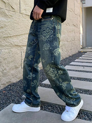 Angled side view of blue jeans with pale ornamental motifs