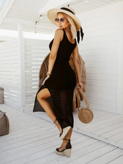 Side view of black sleeveless sweater dress with lace-up detail