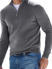 Charcoal gray quarter-zip sweater modeled with blue jeans