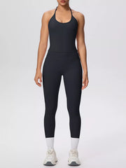 Garment detail view of halter neck cami and high-waisted leggings active set