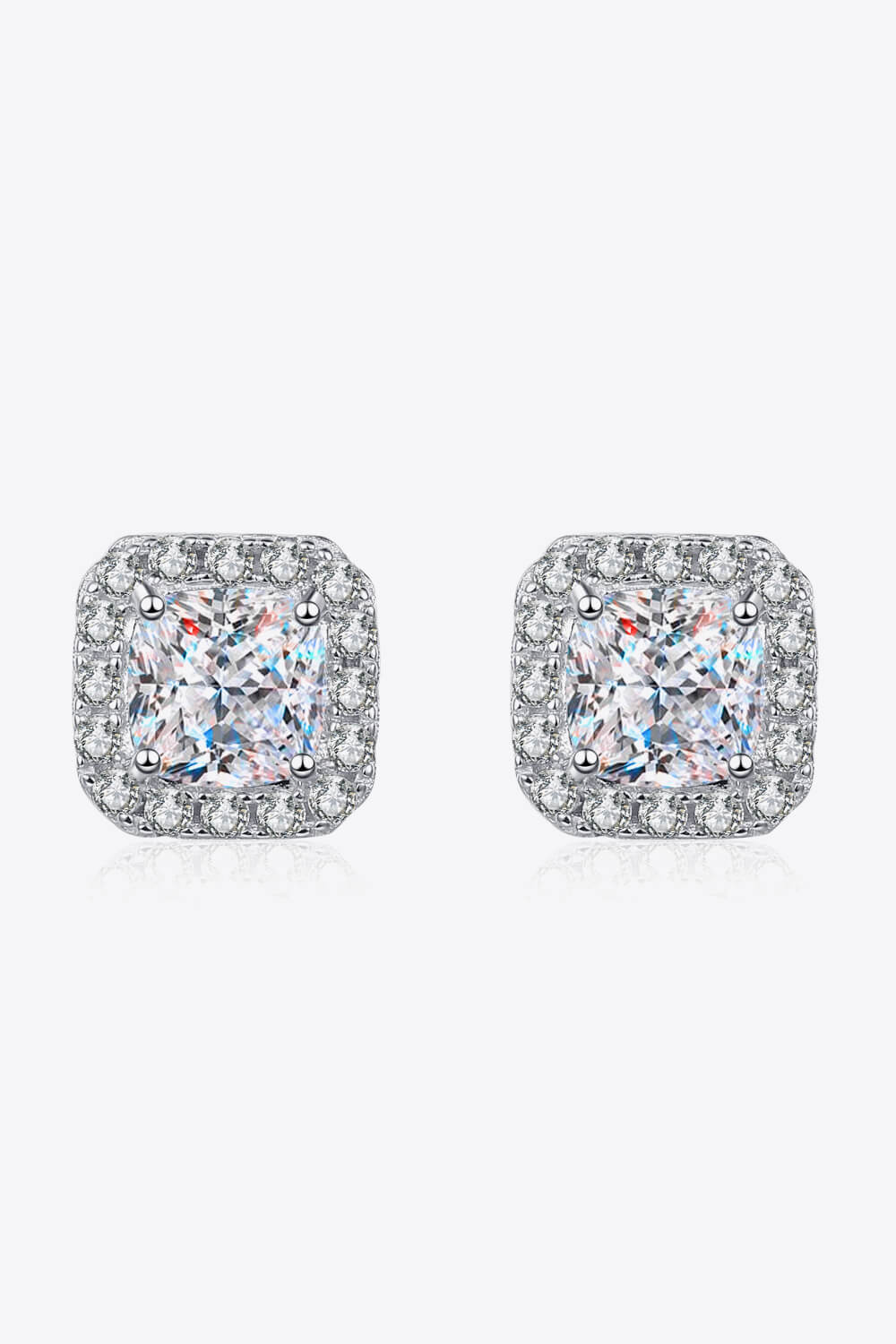 Front view of square clear-stone cluster stud earrings on white