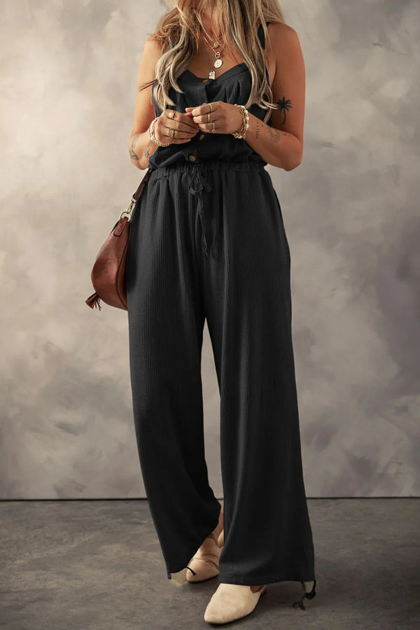 Knotted strap button-front textured drawstring jumpsuit