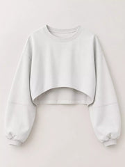 Light gray cropped sweatshirt shown flat from the front with gathered sleeve cuffs