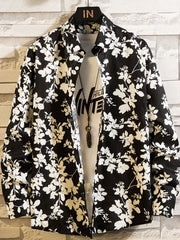 Black shirt with white floral print, front view