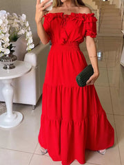 Model wearing a red off-shoulder ruffled maxi dress with a gathered waist